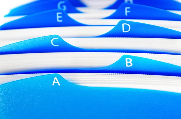 Blue organizer by letters — Stock Photo, Image
