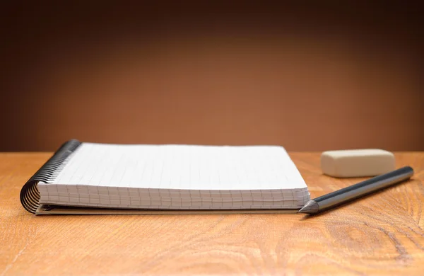 Notebook ,pencil and eraser — Stock Photo, Image