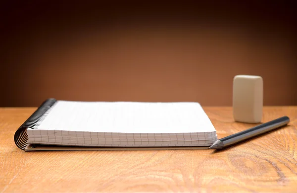 Caderno, lápis e borracha — Fotografia de Stock