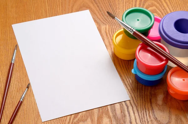 Blank sheet of paper and drawing accessories — Stock Photo, Image