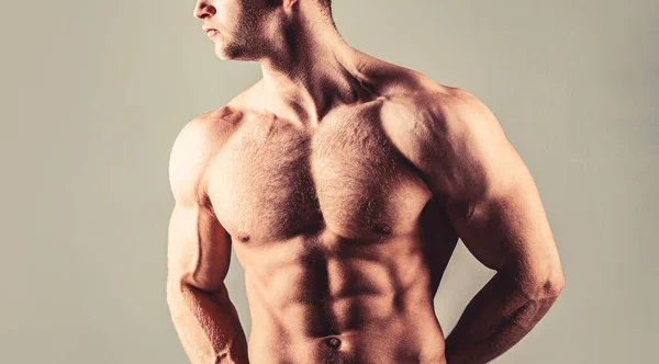 Torso with six pack and ab muscle. Abs and biceps. Strong brutal guy. Sexy torso. Handsome big muscles man posing at studio. Muscular sexy man. Handsome sexual strong man with muscular body — Stock Photo, Image