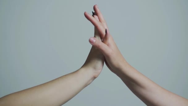 Male hand united in handshake. Woman help hands, guardianship, protection. Two hands, isolated arm, helping hand of a friend. Friendly handshake, friends greeting — Stockvideo