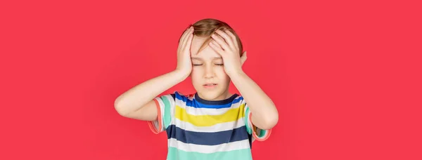 Portrait Sad Boy Holding His Head His Hand Isolated Red — Stock Photo, Image