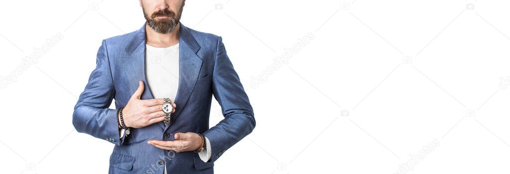 Businessman checking time from watch. Business man showing time on his wrist watch. Hand in with wrist watch in a business suit. Elegant handsome man in suit.