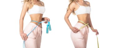 Athletic slim woman measuring her waist by measure tape after diet. Fit fitness girl measuring her waistline with measure tape.