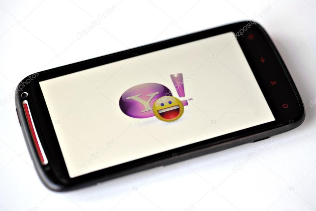 Bucharest, Romania - March 28, 2012: Yahoo! Messenger logo is displayed on a mobile phone screen. Yahoo! Messenger is an advertisement-supported instant messaging client.