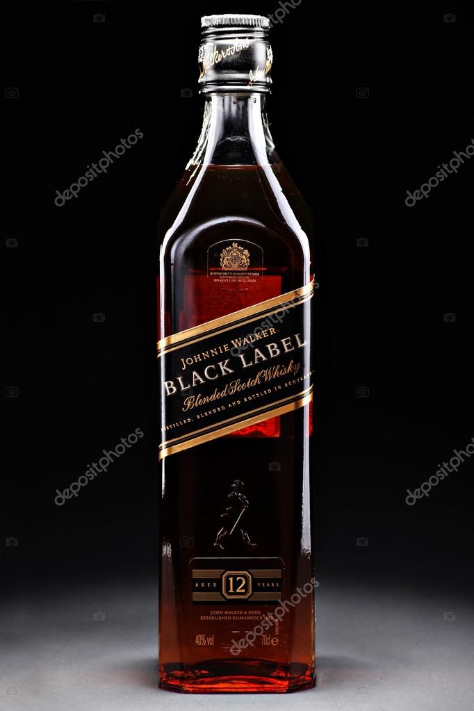 Bucharest, Romania - April 17, 2012: Close-up shot of a bottle of Johnnie Walker whiskey. Johnnie Walker is a brand of Scotch Whisky owned by Diageo and originated in Kilmarnock, Ayrshire, Scotland.