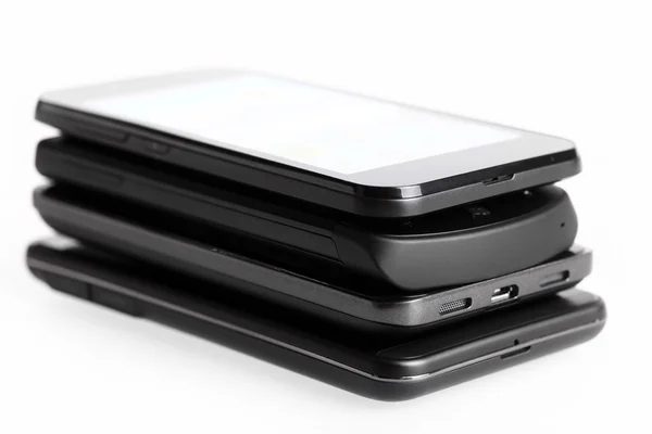 Quatro smartphones — Fotografia de Stock