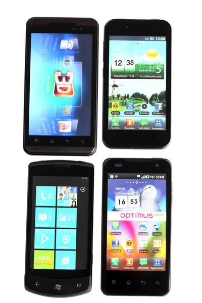 Fyra smartphones — Stockfoto