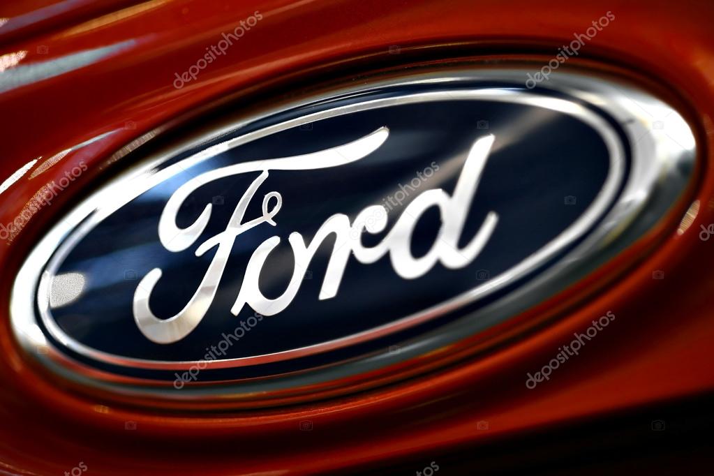 Bucharest, Romania - October 22, 2012: Ford logo is displayed on a car in Bucharest. Ford Motor Company is an American automaker with its headquarters in Dearborn, Michigan and was founded by Henry Ford.