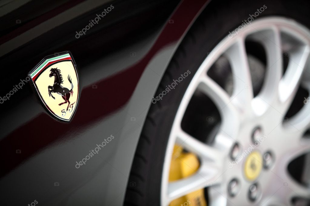 Bucharest, Romania - April 4, 2013: Ferrari logo is displayed on a car's hood in Bucharest. Ferrari is an Italian sports car manufacturer based in Maranello, Italy.