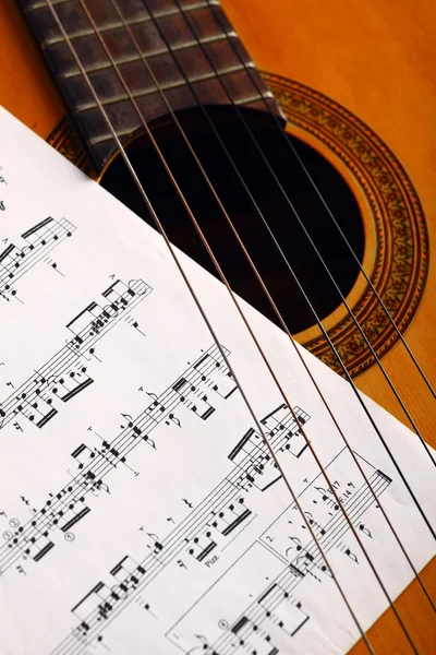 Classical guitar and notes — Stock Photo, Image