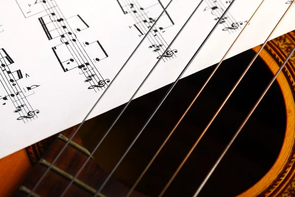 Classical guitar and notes — Stock Photo, Image
