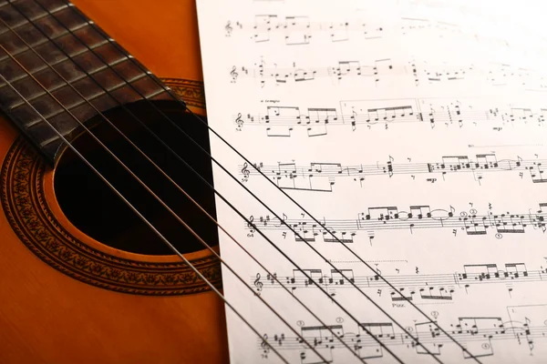 Classical guitar and notes — Stock Photo, Image