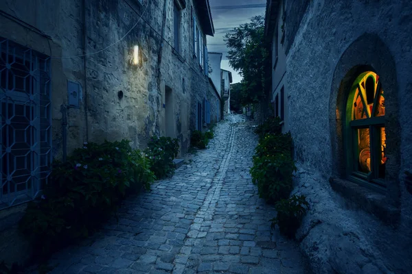 Old narrow town street in Alacati, Turkey