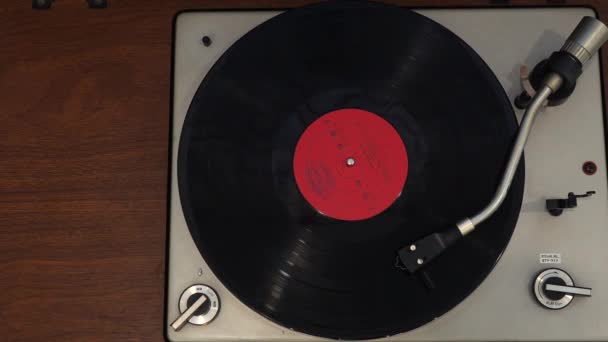 Cinemagraph Loop Vintage vinilo tocadiscos reproductor de discos desde arriba — Vídeo de stock