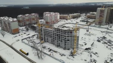 building construction in the winter. 4k drone footage