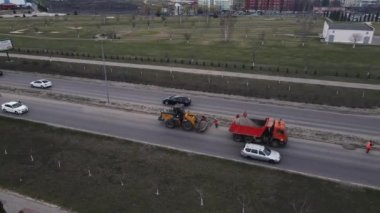 life support services clean the roads from debris. 4k drone footage