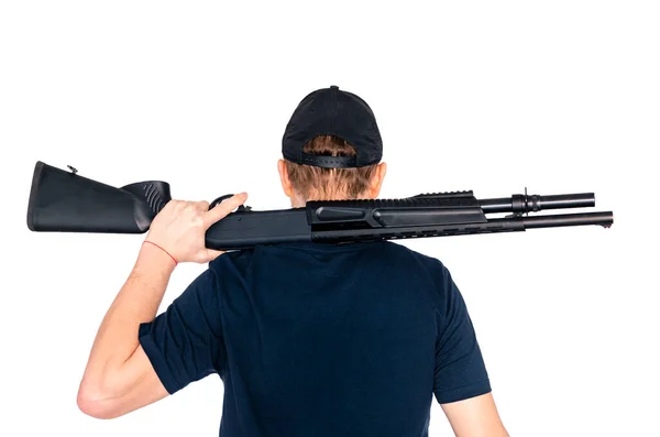 Hunter sosteniendo un rifle sobre su hombro aislado sobre fondo blanco —  Fotos de Stock