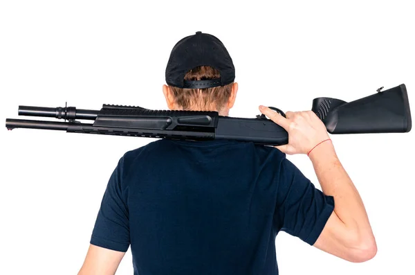 Hunter sosteniendo un rifle sobre su hombro aislado sobre fondo blanco —  Fotos de Stock
