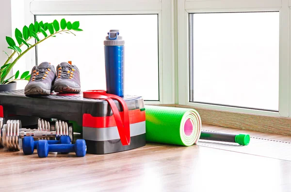 A set of sports equipment for sports at home. Fitness kit at home.