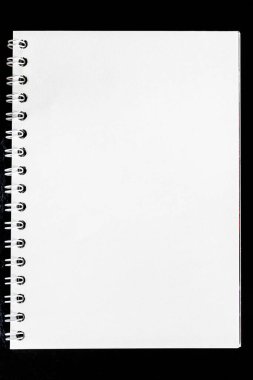 White notepad for notes lies on a black background. Mockup
