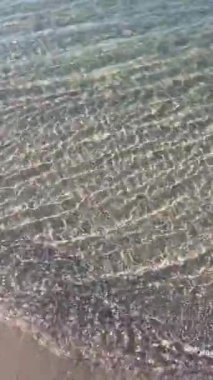 Sea wave texture. Meditation by the clear water