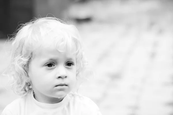 Two-year-old sad girl - black and white — Stock Photo, Image