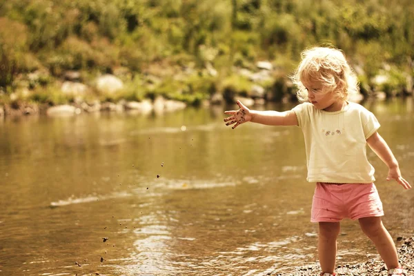 Portrait of a two-year girl at the river — Stock Photo, Image