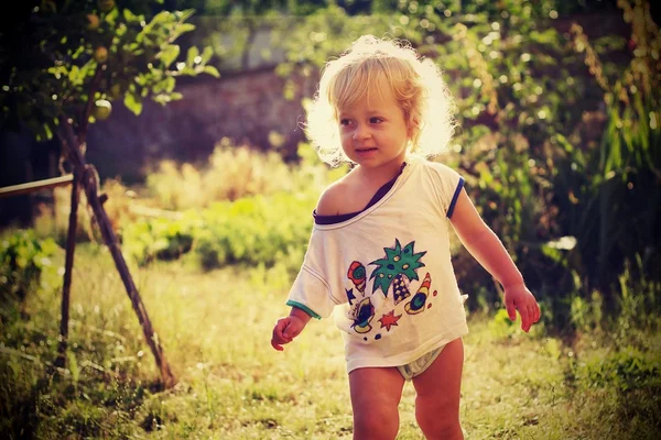 Two-year-old gardener — Stock Photo, Image