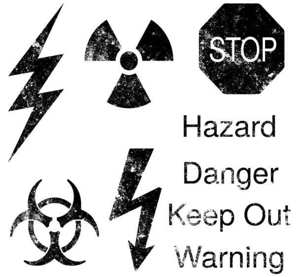 A set of grunge danger and hazard icons — Stock Vector