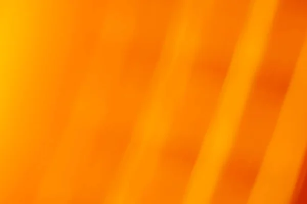 明るいオレンジ色の斜めに縞模様の抽象的なバナーの背景と柔らかいグラデーション — ストック写真