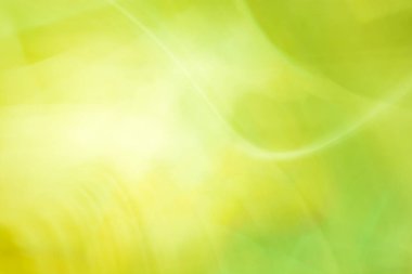 Yeşil sarı soyut afiş arkaplanı. Dalgalar ve çizgiler. Işık bulanıklığı. Yaz bahar arkaplanı