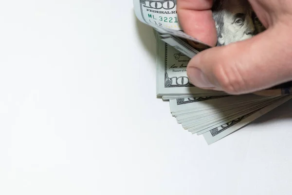 Man Counts 100 Dollar Bills His Hand White Background Money — Foto de Stock