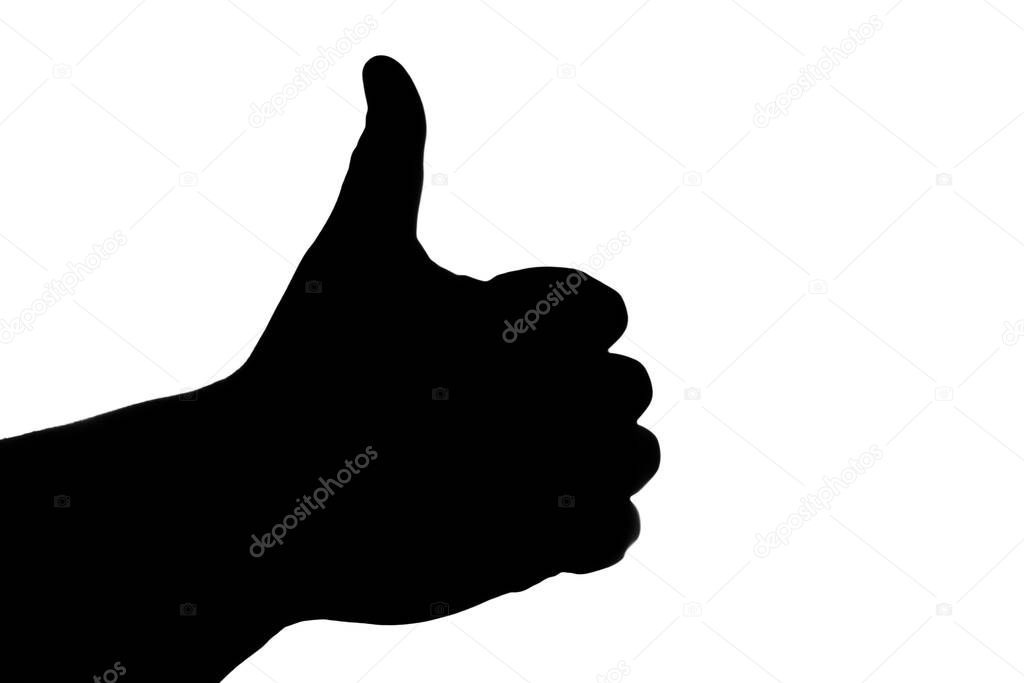 Black freehand silhouette with a raised thumb up on a white background. Like.