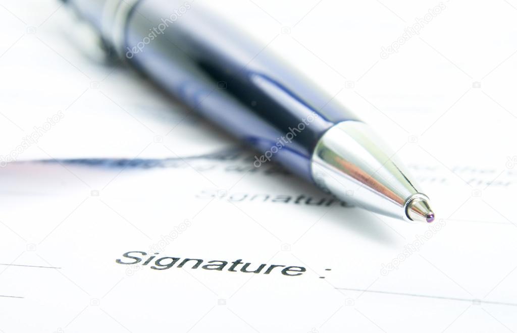 Signing a contract.