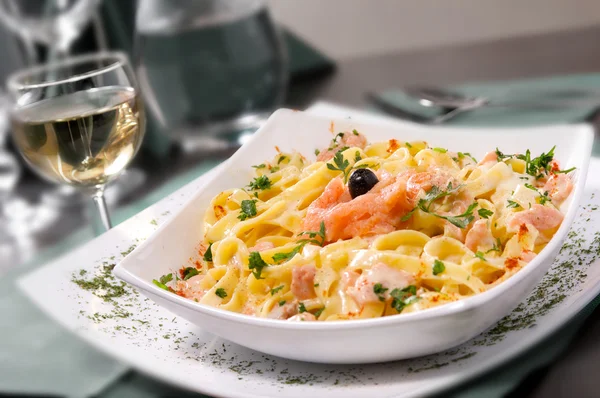 Pasta met zalm Stockafbeelding