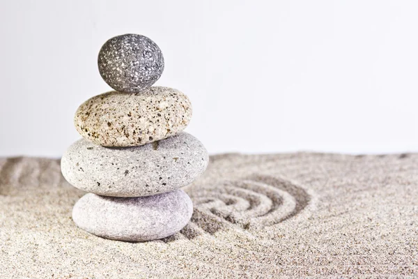 Three stones in the sand — Stock Photo, Image