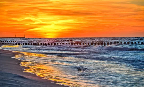 Holiday sunset on the beach — Stock Photo, Image