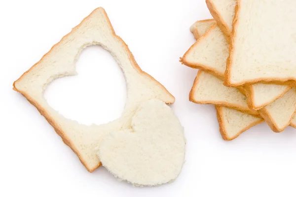 Chleb kształt serca i plastry ze ścieżką przycinającą — Zdjęcie stockowe
