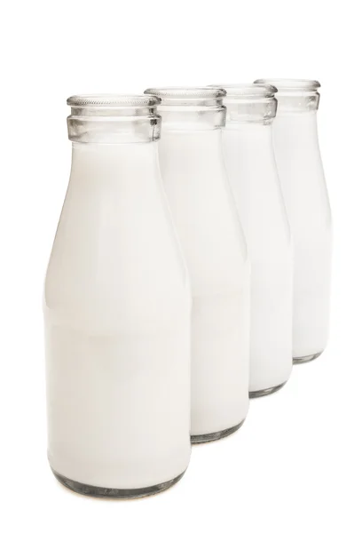 Full milk bottles with clipping path — Stock Photo, Image