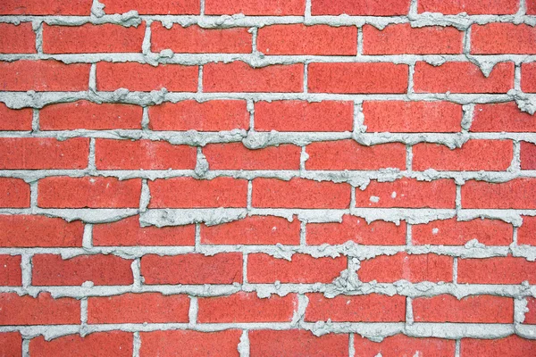 正方形、赤レンガで作られた壁 — ストック写真