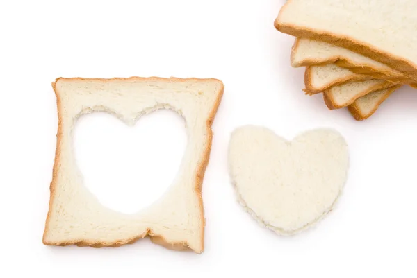 Forma de corazón pan y rebanadas — Foto de Stock