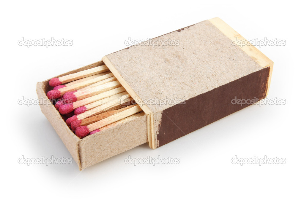 Matchbox with match sticks on white