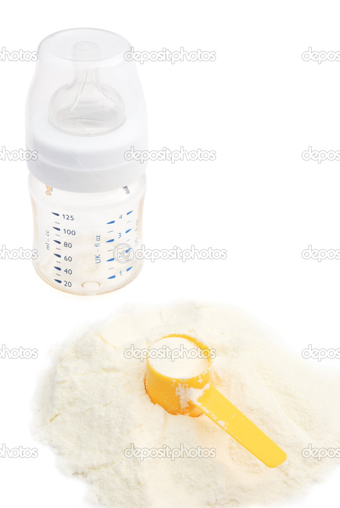 Powder milk and bottle on white