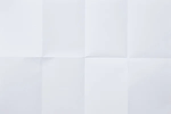 White sheet of paper folded in eight — Stock Photo, Image