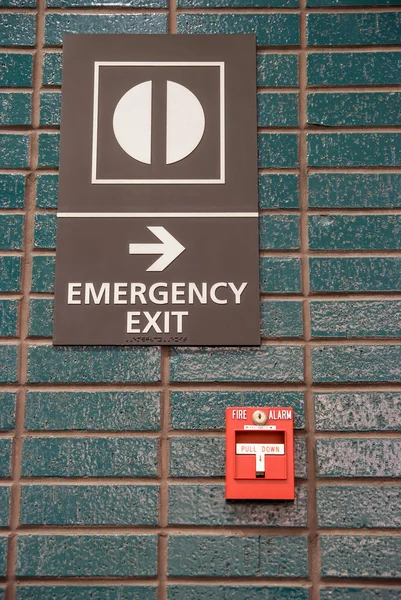 Fire alarm and emergency exit — Stock Photo, Image