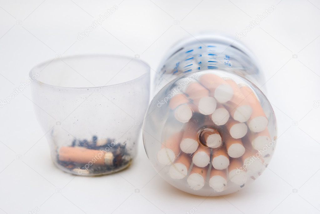 Baby bottle with cigarette,horizontal