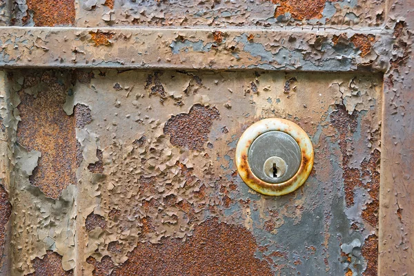 Old rusty metal plate and lock heavily aged and corroded — Stock Photo, Image