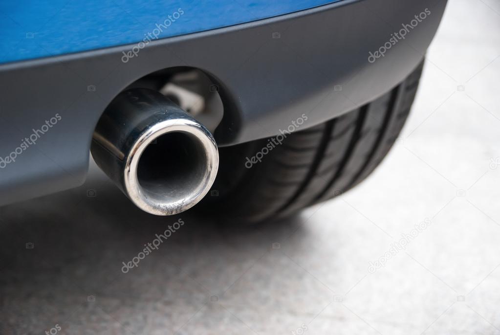 Exhaust pipe of a blue car